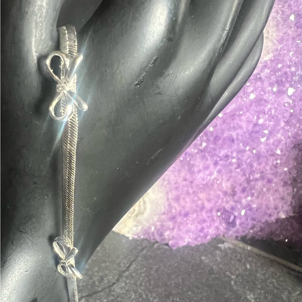 Hallmarked 925 . Elegant Silver Bow Bracelet